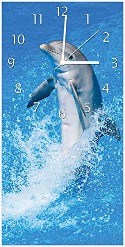 Wallario Design-Wanduhr Fröhlicher Delfin im blauen Wasser aus Glas, Motiv-Uhr Größe 30 x 60 cm, weiße Zeiger