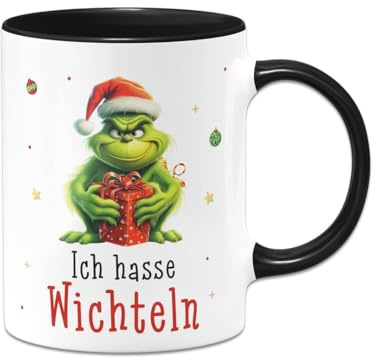 Tassenbrennereich Wichtelgeschenk Tasse Grinch - Ich hasse Wichteln - Anti-Weihnachtstasse lustig mit Grinchmotiv - Kaffeetasse mit Spruch - Schrottwichteln (Schwarz)