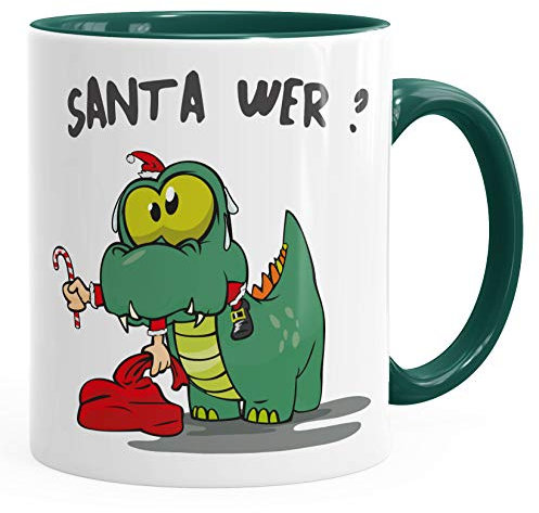 MoonWorks® Kaffee-Tasse Dinosaurier frisst Santa Claus Spruch Santa Wer? Weihnachtsmann Weihnachtstasse lustig Gruen Keramik-Tasse