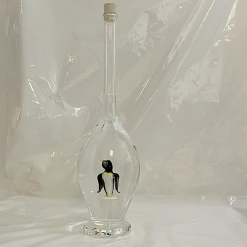 Botella de cristal rellenable con cierre, jarra decorativa soplada a mano, con color. Pingüino en el interior soplado a mano. Altura aprox. 30 cm. Capacidad: 0,5 litros