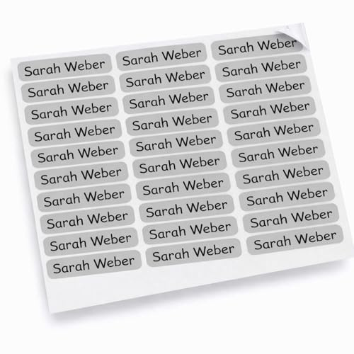 Indigos UG - Namensaufkleber Kinder Schule - 300 Sticker 36x7 mm - grau - personalisiert mit Wunschname - Etiketten für Schulheft, Schultüte, Federmappe, Stifte, Kindergarten