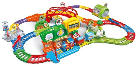 VTech - TUT TUT Bolides Super Circuit Zug Lernzug – Elektronische Rennbahn für Kinder mit Adam Einkaufszug, 6 magische Zonen – Geschenk für Jungen und Mädchen von 1 Jahr bis 5 Jahren – Inhalt auf
