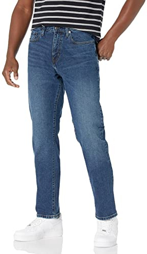 Amazon Essentials Vaqueros elásticos, Corte Holgado (Disponibles en Tallas Grandes) - Colores interrumpidos Hombre, Lavado Medio, 54W / 30L