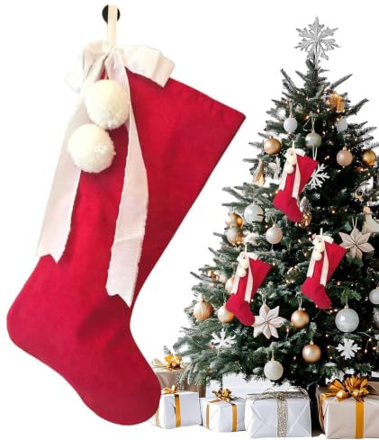 Traditionell julstrumpa Dekoration Av Röda Julsockor Med Vit Rosett