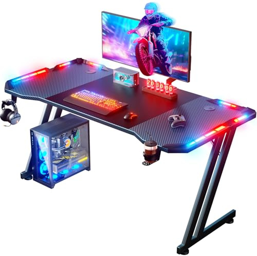 HLFURNIEU Mesa Gaming con LED, 120 x 60 cm Ergonómico Mesa Gamer, Escritorio Gaming con Superficie de Fibra de Carbono, Escritorio Gamer con Portavasos y Gancho para Auriculares, Negro
