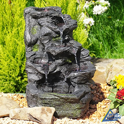FUENTE PARA CASA JARDÍN FUENTE FUENTE INTERIORES 230V | con 4 luces LED RGB que se encienden solas al anochecer | Fuente similar a una fuente de piedra real | CASCADA EN LA ROCA