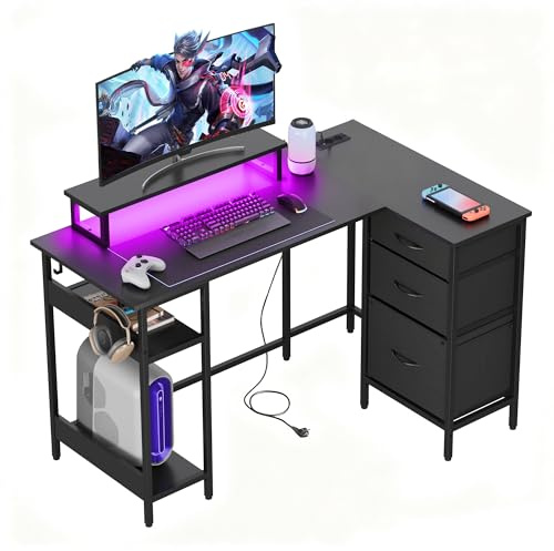 DEVAISE Eckschreibtisch L Form 120 x 80 cm mit Schubladen mit Steckdose und USB, Computertisch mit Ablageflächen für Homeoffice, Gaming & Schlafzimmer, Schwarz