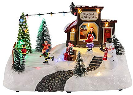 LED Weihnachts Szene Eisbahn mit fahrenden Figuren - 26x18x14 cm - Winter Dorf Tisch Deko beleuchtet