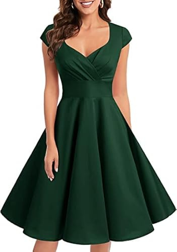 1950-tals cocktailklänning i vintage-/retrostil från Bbonlinedress. Rockabilly, V-ringad, veckad kjol, aftonklänning, festklänning.
