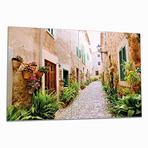 Wallario Herdabdeckplatte/Spritzschutz aus Glas, 2-teilig, 80x52cm, für Ceran- und Induktionsherde, Südländische Gasse mit Alten Häusern und grüner Oase