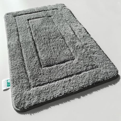 KARAT Badteppich Atlantis - extra flauschig & schnelltrocknend - Badezimmerteppich mit rutschsicherer Rückseite - Badematte Duschvorleger (70 x 120 cm, Dunkelgrau)