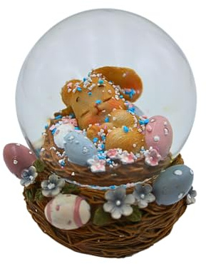 Dekohelden24 Schneekugel, Schüttelkugel, Oster - Schneekugel, Schneekugel mit Osterhase, Osterhase im Korb, Osterkugel zum Schütteln mit bunten Kugeln und Korb als Sockel, L/B/H 7 x 7 x 9 cm.
