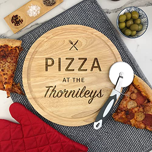 eBuyGB Personalised Wooden Pizza Board, 30cm Custom Chopping Board, Pizza Serving Board, Birthday Present, New Home - Any Surname Engraved