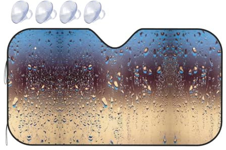 Gouttes de pluie sur le verre. Le pare-soleil pour pare-brise de voiture (version feuille d'aluminium) mesure 130 x 69,8 cm et 140 x 76,2 cm, ce qui est parfaitement adapté au pare-brise avant de la