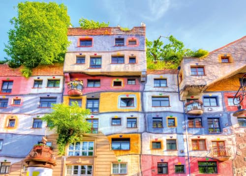 Ulmer Puzzleschmiede - Puzzle „Hundertwasser-Haus“ - 2000 Teile Puzzle – das Bunte Haus vom Künstler Friedensreich Hundertwasser in Wien, Österreich als farbenfrohes Puzzlemotiv