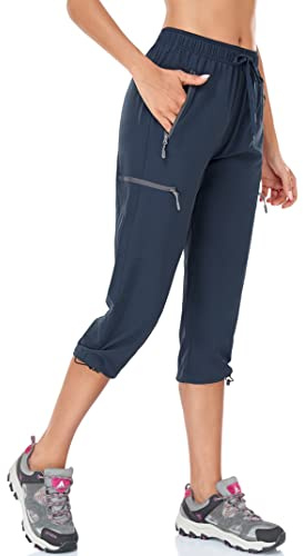 BAYGE Pantalon de Randonnée pour Femme, Léger et Estival, 3/4, Respirant, Séchage Rapide, Imperméable, Coupe-Vent, Fonctionnel avec Poches à Fermeture Éclair