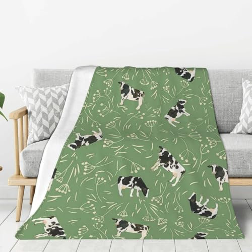 Manta de granja con patrón de vaca lechera, diseño floral verde y blanco