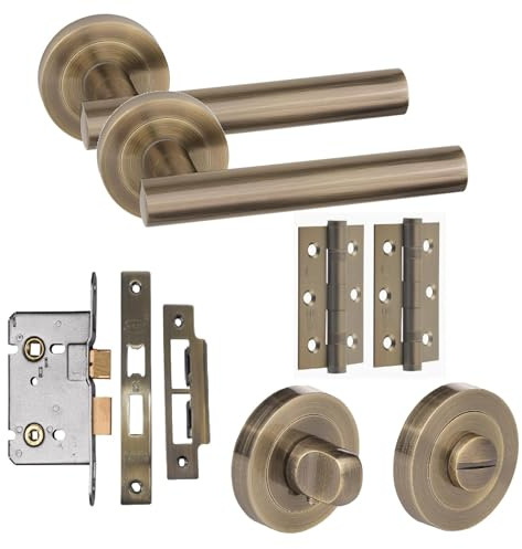 Golden Grace T-Bar Bathroom Door Handle Set with Lock, Antique Brass | Includes 3-inch ball bearing hinges and a 64mm antique brass latch to resist bathroom humidity, with sleek rose base handles.