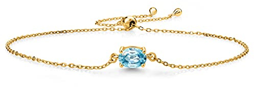 Gem Stone King 7X5MM Oval Gemstone Birthstone Solitaire Bracelet | 925 Sterling Silver | Adjustable Bolo Bracelet | Fine Jewelry for Her Mom Wife | Blue Zircon | Yellow Gold