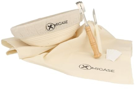 Cesta de fermentación MIGASE® redonda con 25 cm de ratán 100% natural, funda de lino, dos cuchillos de panadería con protección de hoja (hoja recta y curvada) y un paño de fermentación con 74 x 44 cm.