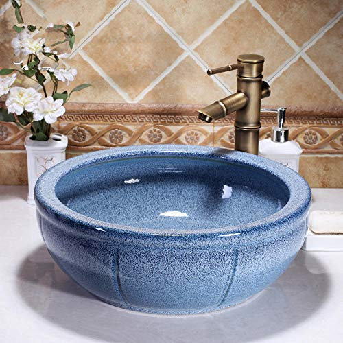 VEETHI Waschbecken im Badezimmer, Aufsatzwaschbecken. Keramikwaschbecken auf der Theke in der blauen Garderobe. Waschbecken aus Keramik im Badezimmer