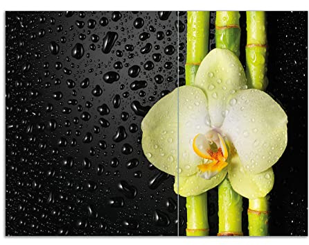 Wallario Herdabdeckplatte/Spritzschutz aus Glas, 2-teilig, 70x52cm mit 13 mm hohen Füßen, für Ceran- und Induktionsherde, Grüne Orchidee mit Bambus auf schwarz - Regentropfen