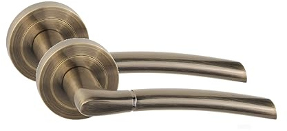 Golden Grace Indiana Antique Brass Door Handles on Rose, 1 Pair | Smooth metal construction offers a comfortable, secure grip, bringing a sleek and elegant touch to interior doors.