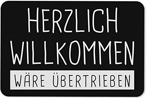 Tassenbrennerei Fußmatte mit Spruch Herzlich Willkommen wäre übertrieben - Fußabtreter, lustige Türmatte - Geschenk (Schwarz)