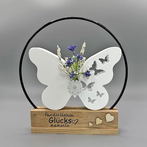 Deko - Schmetterling aus keramischem Gießmaterial auf Naturholz-Standfuß, mit schwarzem Metallring & blauen Blüten, handgemacht