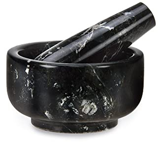Mortero y mortero de mármol negro del Himalaya clásico