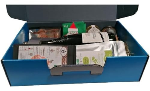 Koffer: Grüner Tee 50 g, brasilianischer Kaffee 125 g, Fruchtpaste 120 g, Terrine 90 g, Feigen-Foie-Gras-Terrine 100 g, Weihnachtsstrumpf, 1 Coteaux du Layon 75 cl.