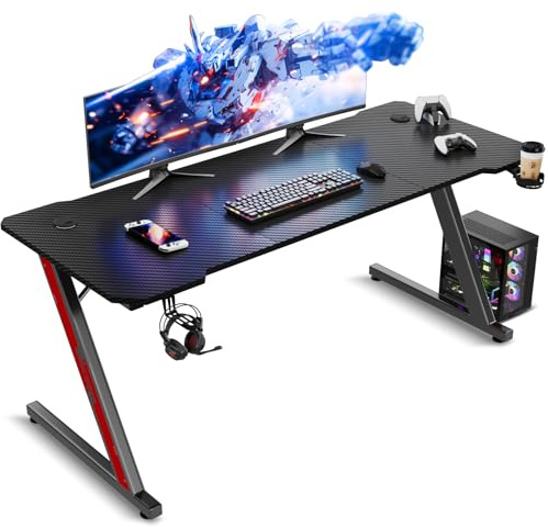 TRIUMPHKEY Mesa Gaming 140 x 60 cm, Escritorio Gaming en Forma de Z Ergonómica, Mesa Gamer de Fibra de Carbono, Mesa para Ordenador con Portavasos y Gancho para Auriculares, Negro