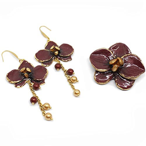 Orecchini pendenti e spilla con orchidea bordeaux e oro
