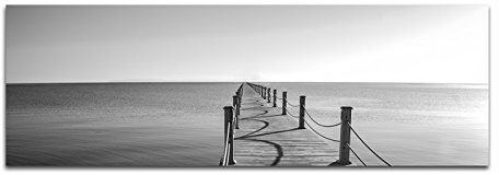 Paul Sinus Art Panoramabild auf Leinwand und Keilrahmen 150x50cm Meer Holzsteg schwarz/weiß