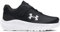 Under Armour UA BINF Surge 4 AC Deportivas para niño, cómodo y ligero calzado infantil, color negro/gris antracita/blanco