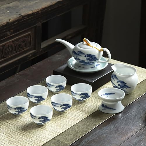 Juego de té de porcelana china azul y blanca con tetera, tazas, colador e infusor, diseño tradicional de paisaje