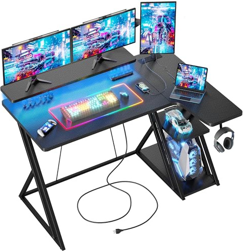 BEXEVUE L Shaped Gaming Desk with LED and Power Outlet, 120x70 cm RGB Computer Desk with Carbon Fiber Desktop Gaming PC Desk with Head Phone Hook for E-sport Gamer Table, Home Office desk, Black