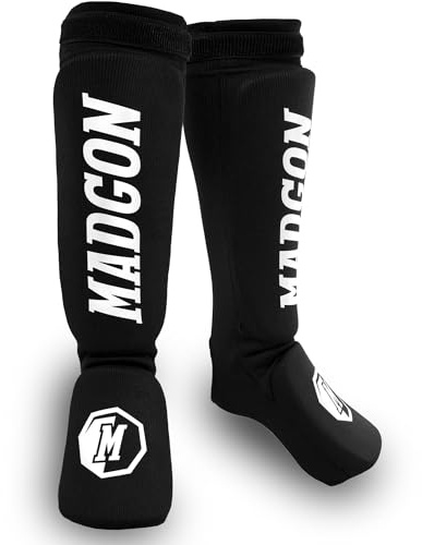 MADGON Schienbeinschoner mit perfektem Sitz und idealer Polsterung! Schienbein-Schutz mit geringer Schweißentwicklung. Beinschützer aus Stoff für Kampfsport, MMA, Kickboxen - 1 Paar inkl. Beutel!