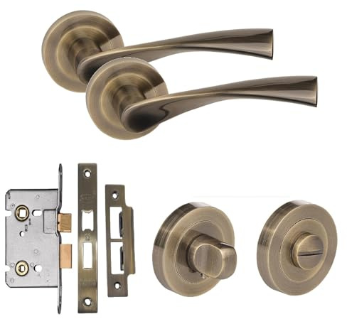 Golden Grace Astrid Bathroom Door Handle Set with Mortise, Antique Brass | Includes one pair of metal fittings on a sleek rose base. Antique Brass finish resists humidity and frequent use.