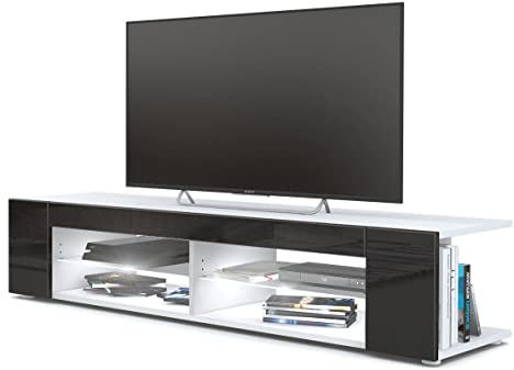 Vladon Lowboard Movie, TV-Kommode mit 4 offenen Fächern und Zierleisten, Weiß matt/Schwarz Hochglanz, inkl. LED Beleuchtung weiß (134 x 29 x 39 cm)