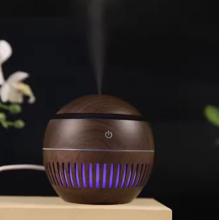 Humidificador ultrasónico. 7 Colores led. Difusor de Aromas eléctrico para el hogar. Capacidad 130 ml. Ultra silencioso con Vapor de Agua.