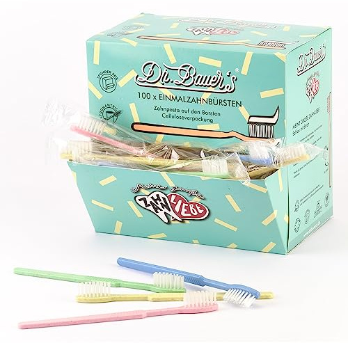 Dr. Bauer's Brosses à dents jetables avec dentifrice – paquet de 100 – brosse à dents de voyage écologique avec paille – pour dentistes, hôtels, camping – distributeur bleu/vert/jaune/rouge