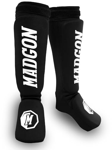 MADGON Espinilleras Kick Boxing Ajuste y Acolchado Ideal – Protección de Espinillas Baja Transpiración – Espinilleras Muay Thai – Protectores de Piernas para Artes Marciales – Incluye Funda