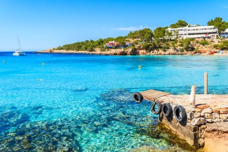 Acryl-Bild 80 x 50 cm: Kleiner Pier und Blick auf das azurblaue Meer in der Bucht von Cala Portinatx, Insel Ibiza, Spanien (93046509)