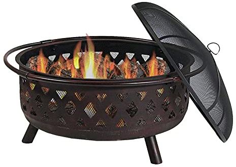 Feuerstelle für den Außenbereich, große, holzbefeuerte Terrasse mit Lagerfeuer und runde Feuerstelle im Hinterhof für draußen mit Funkenschutz und Schürhaken