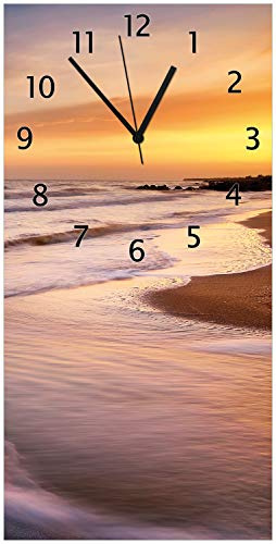 Wallario Design-Wanduhr Sonnenuntergang am Strand - Abendspaziergang aus Glas, Motiv-Uhr Größe 30 x 60 cm, Schwarze Zeiger
