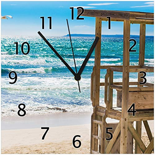 Wallario Design-Wanduhr Badestrand - Mallorca Spanien aus Glas, Motiv-Uhr Größe 30 x 30 cm, Schwarze Zeiger
