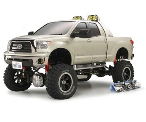 Tamiya 1:10 RC Toyota Tundra HighLift 3-Gang - ferngesteuertes Auto - inkl. 2 Snowboads & Dachträger - Pick Up Truck - RC Bausatz - Offroad - Elektromotor - Metallgetriebe - unlackiert - 58415