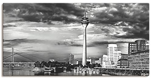 ARTLAND Wanddeko Leinwand Bilder Wandbild 100 x 50 cm Stadt Rheinturm Düsseldorf Fluss Rhein Foto Schwarz Weiß Skyline Q4DE