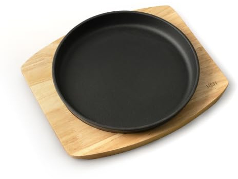 H&H Piastra da Portata in Ghisa 22 cm con Sottopiatto in Legno Chiaro, Riscaldabile in Forno, Compatibile con Induzione, Vetroceramica e Tutti i Piani Cottura